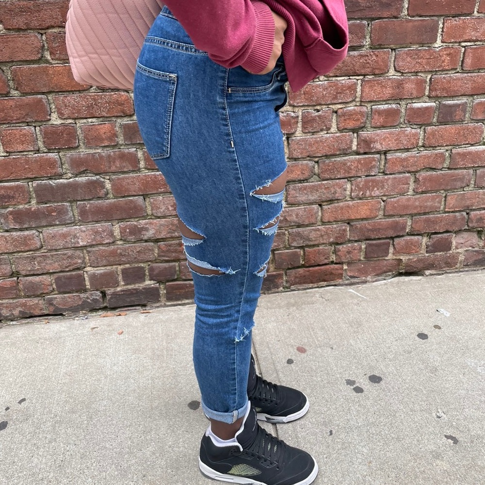 Medium washed distressed jeans, lightly worn, good condition